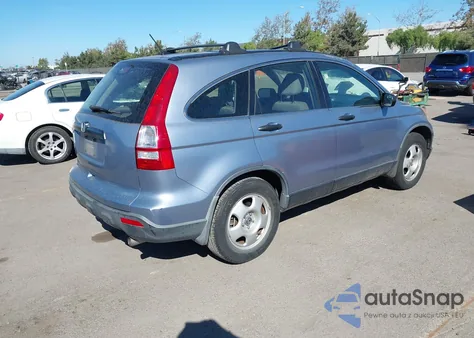 2009 Honda Cr-V Lx z USA, uszkodzony, nr VIN JHLRE38399C013207